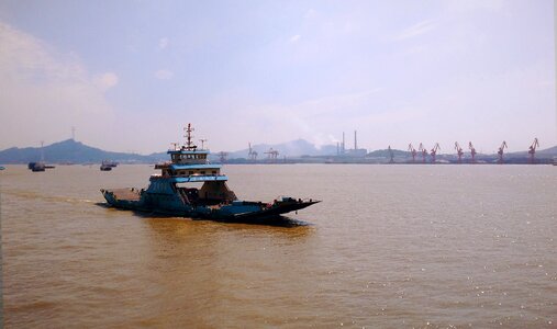 Ship industrial area brown water