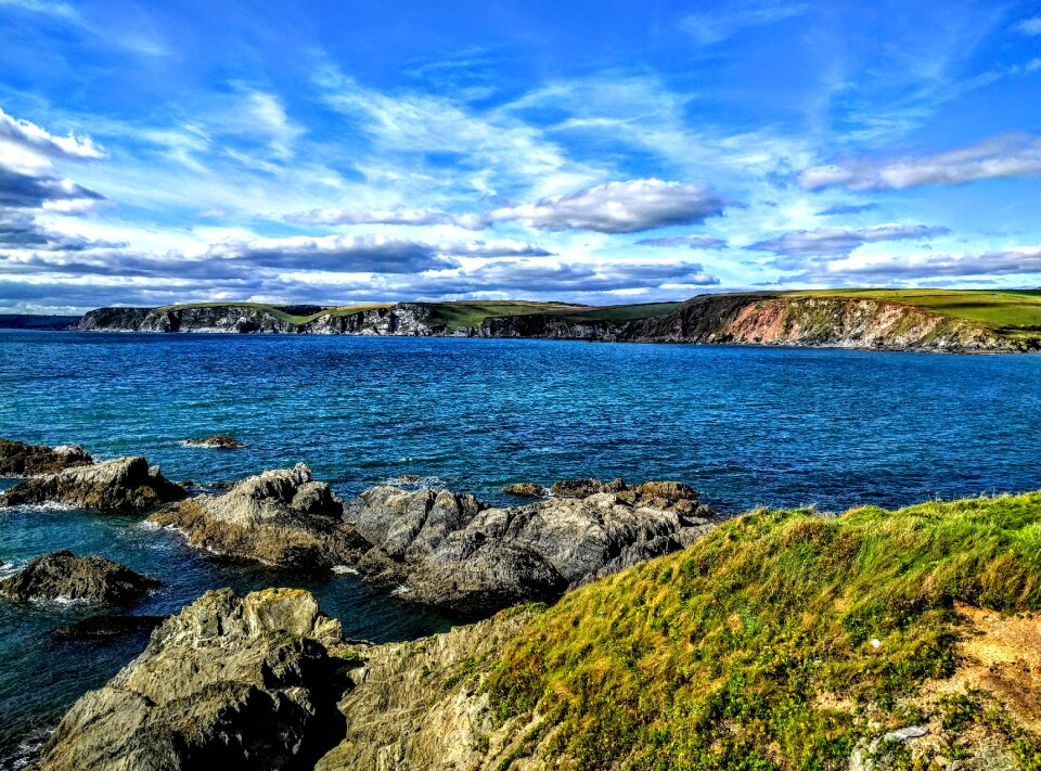 Rocks sea clouds
