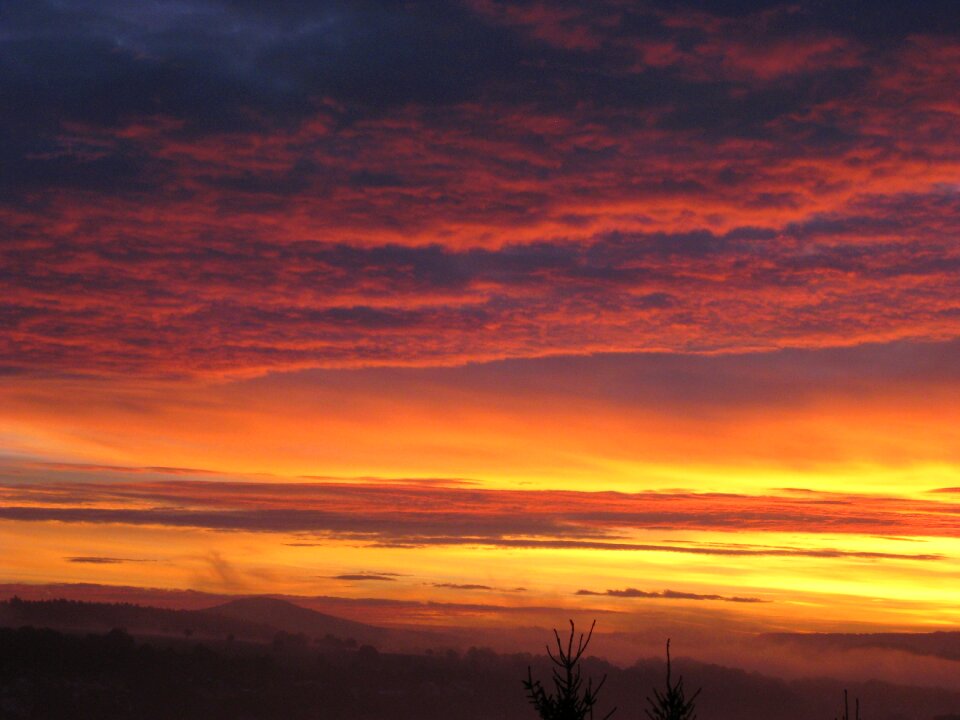 Skies sun bright red photo