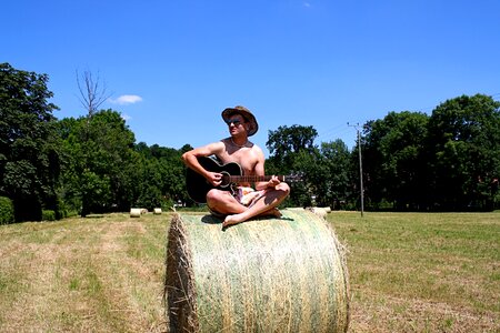 Music boy straw bales photo
