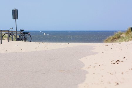 Sand sea bike photo