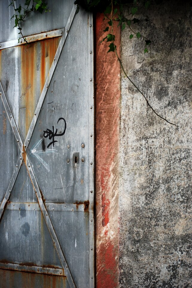Wall by day iron gate