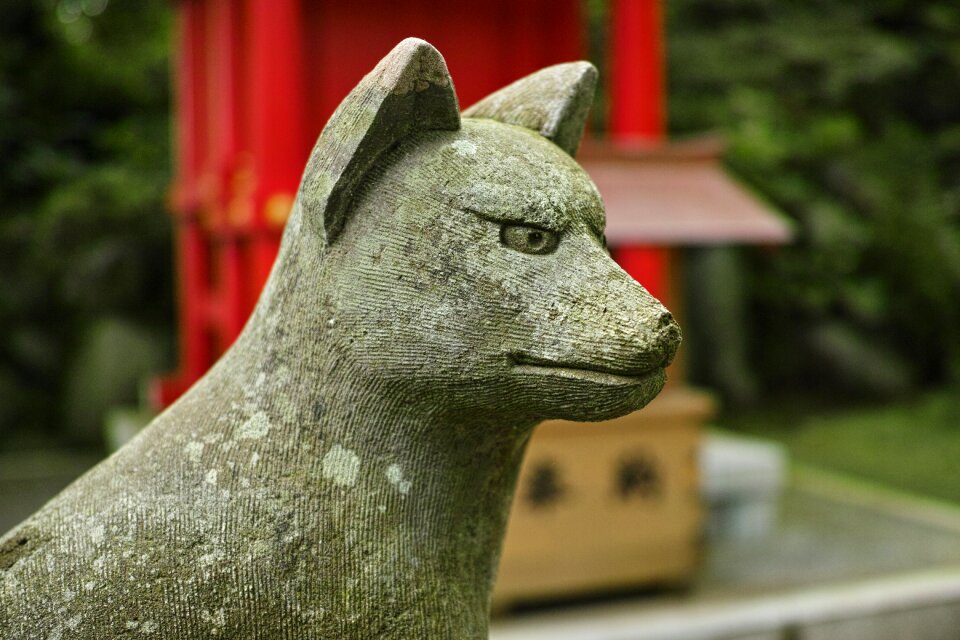 Stone statues fox shrine