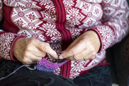 Hands knitting needle wool photo