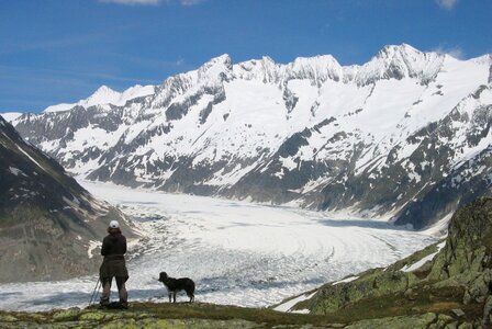 Woman with a dog summit view photo