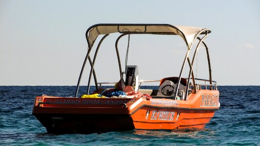 Orange sport vessel photo