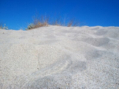 Sand sea sip photo