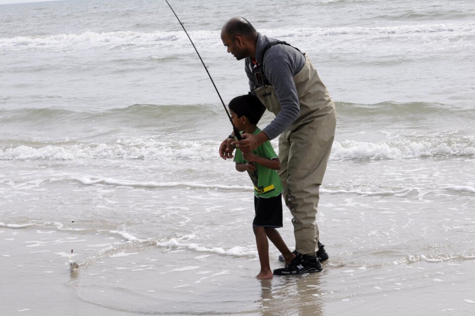 Father son ocean shore