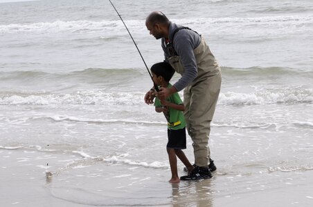 Father son ocean shore