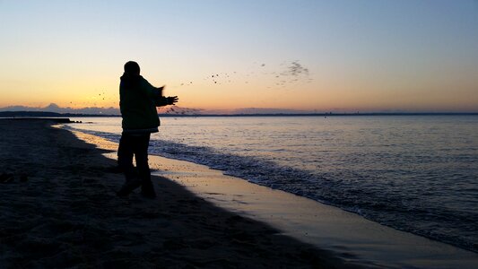 Sunset water silhouette