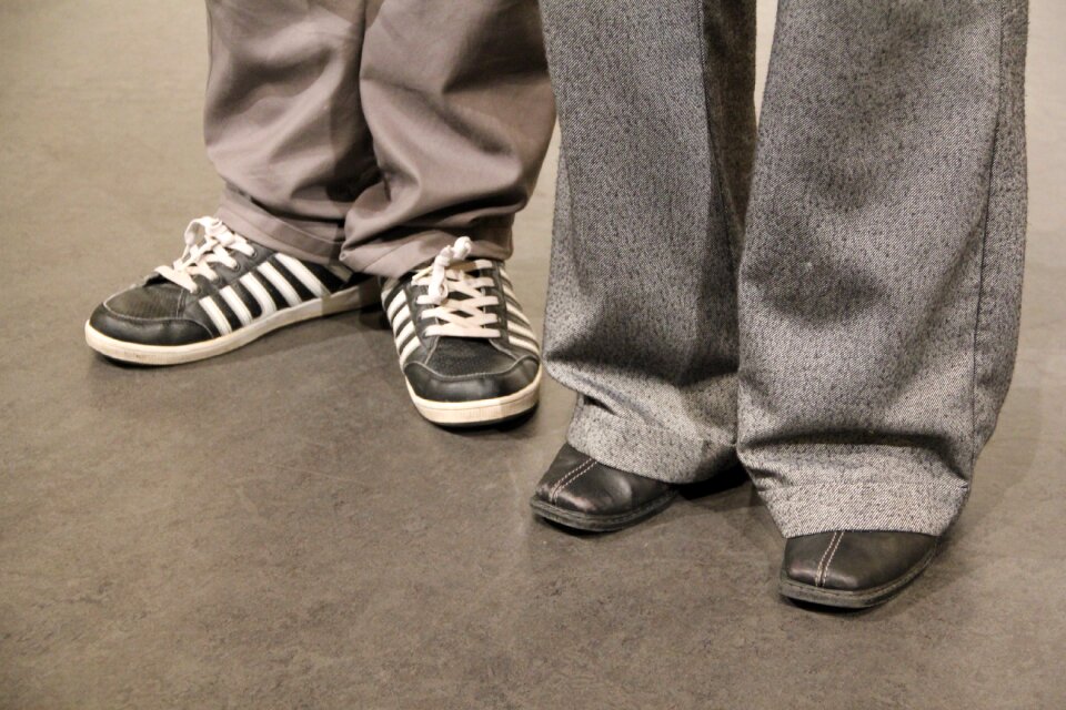 Trouser leg foot sneakers photo