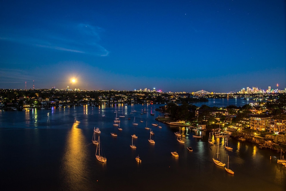 Boats sydney harbour moon