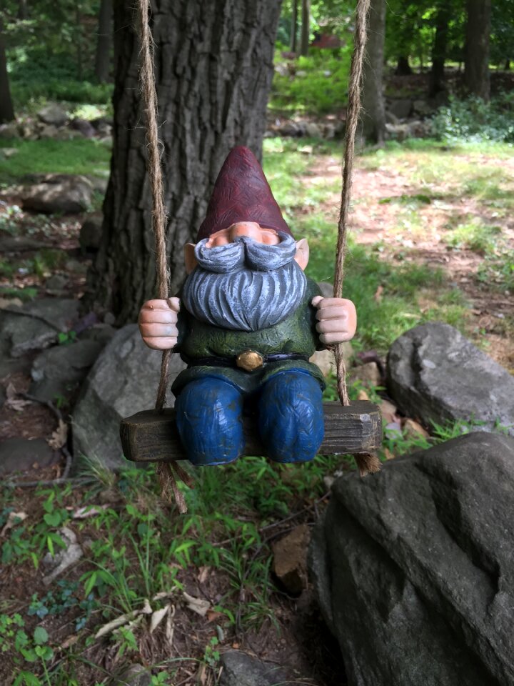 Swinging figure decoration