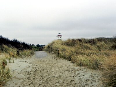 Lighthouse island end wadden sea photo