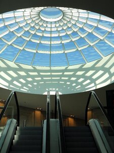 Glass roof escalator shadow
