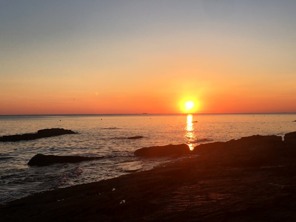 Sky sea rocks photo