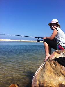 Fishing rod female young photo