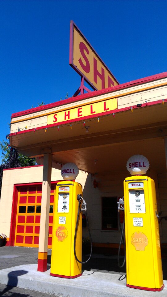 Yellow gas pump blue sky