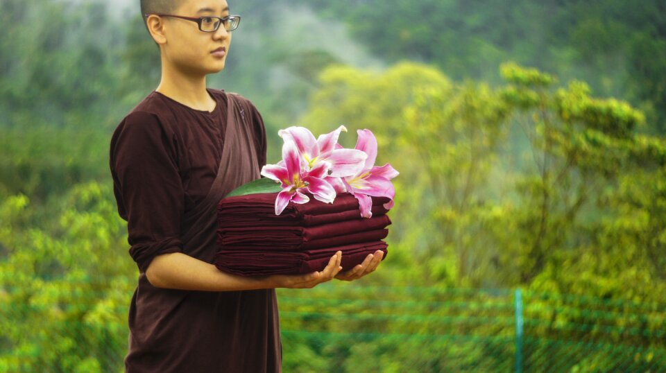 Buddhism sayalay robe and flower photo
