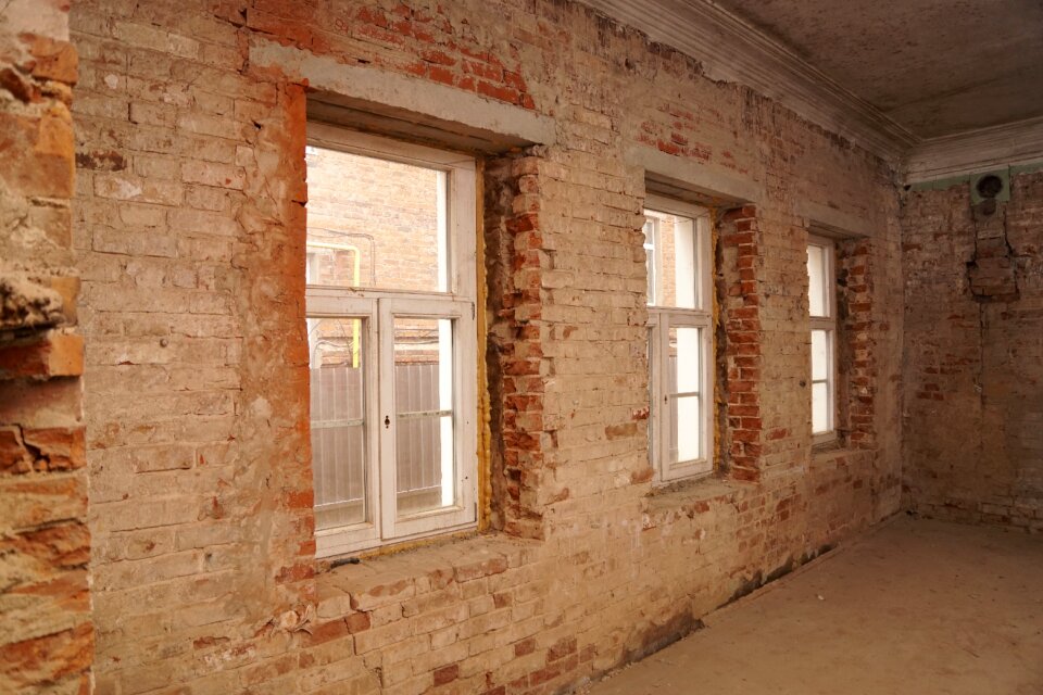 Old windows stucco brick