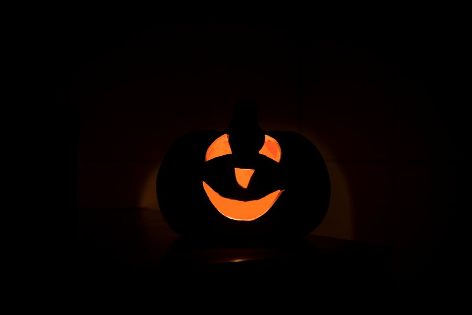 Bright glowing pumpkin carved pumpkin