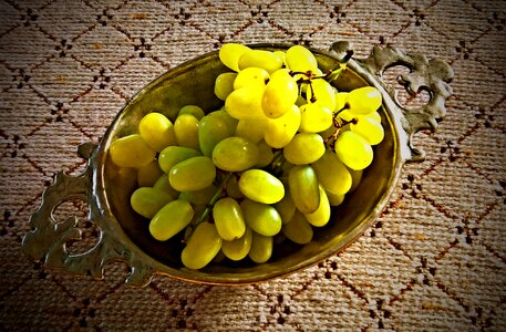 Green grapes seedless in silver bowl photo