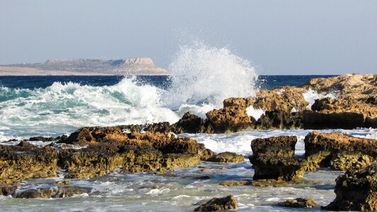 Rocky coast stones wave