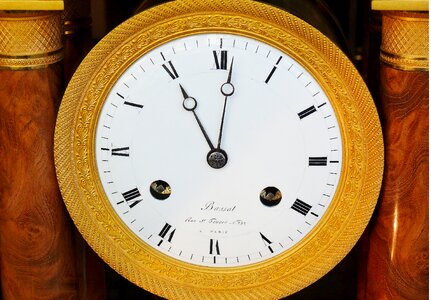 Time indicating time of clock face photo