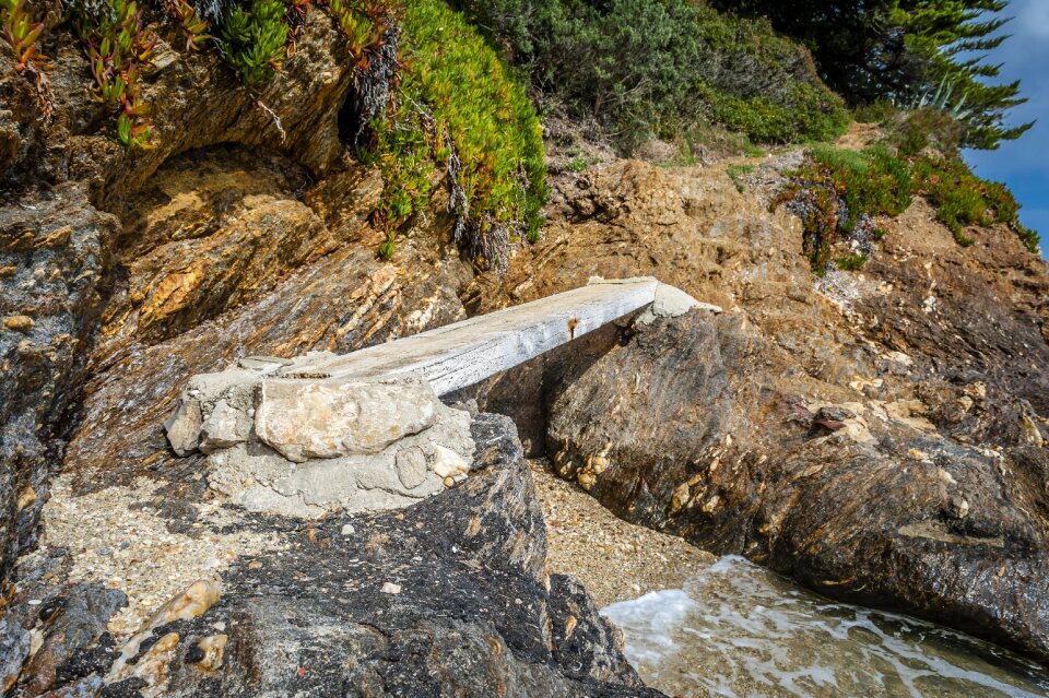 Stone old wooden bridge