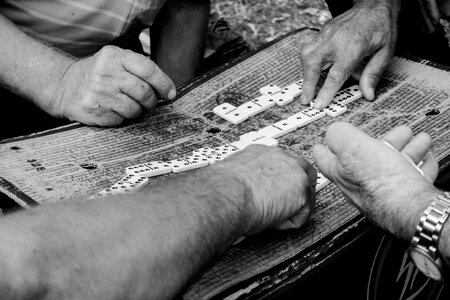Hands gambling domino photo