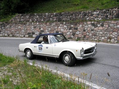 Golden cup of the dolomites vintage car italian style photo