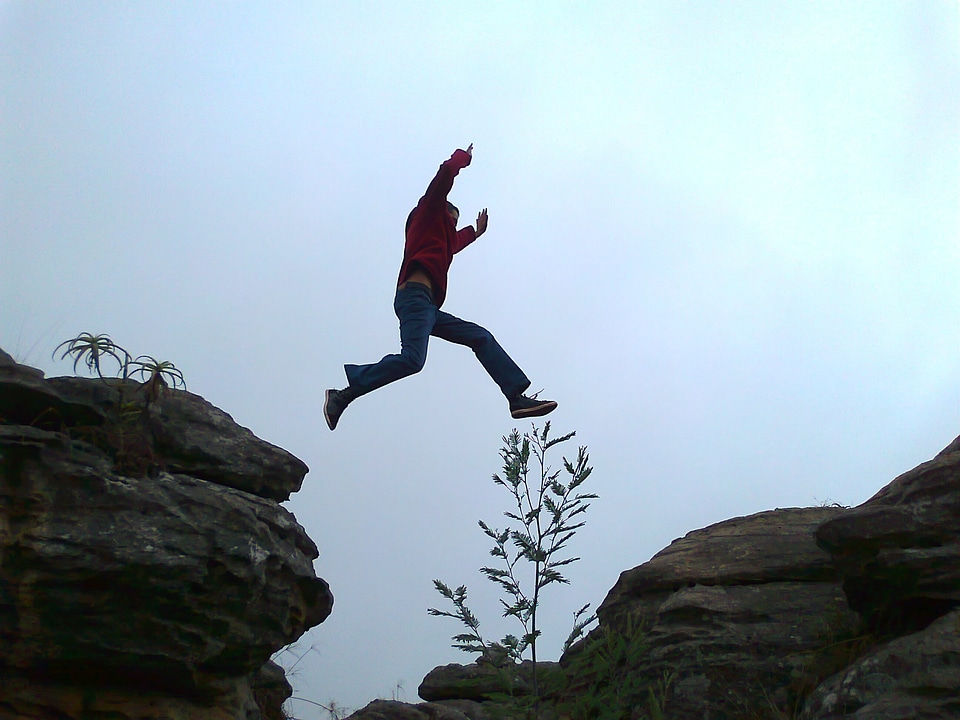 Jumping person courage