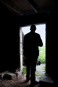 Door opening silhouette male photo