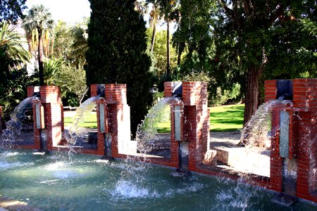 Fountain flow drop of water photo