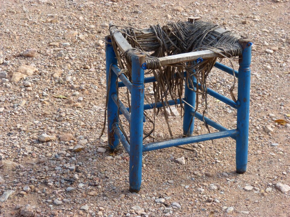Abandoned broken chair wicker