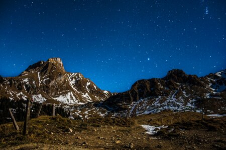 Night night sky mountains photo