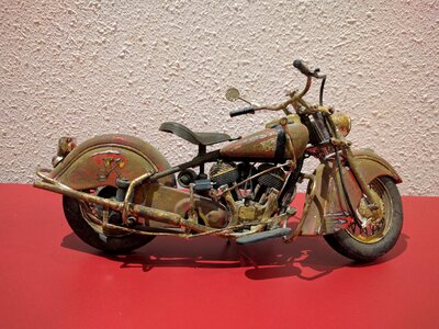 Miniature moto replica