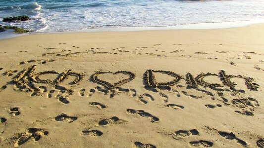 Beach sand inscription romantic