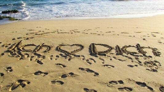 Beach sand inscription romantic photo