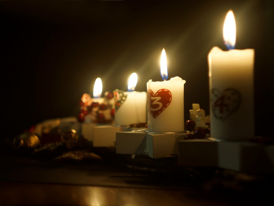 Flame burning candle wax