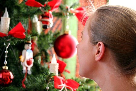 Young woman marvel christmas decorations photo