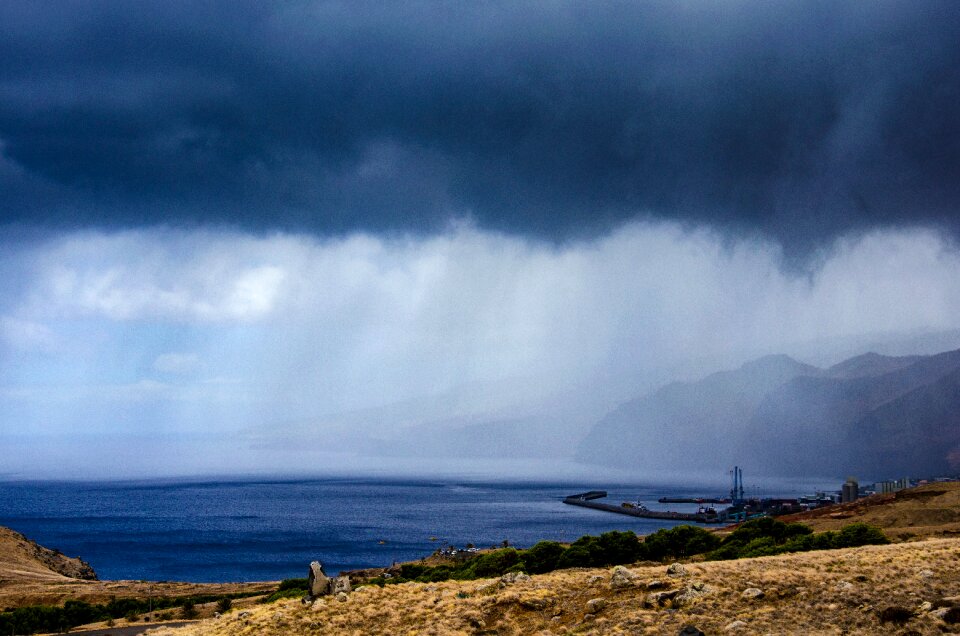 Rain rain over the ocean bay