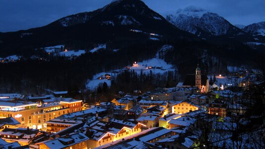 City lights alpine snow