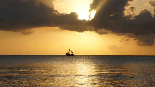 Boat sunset clouds