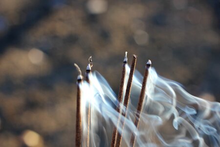 Blow incense sticks photo