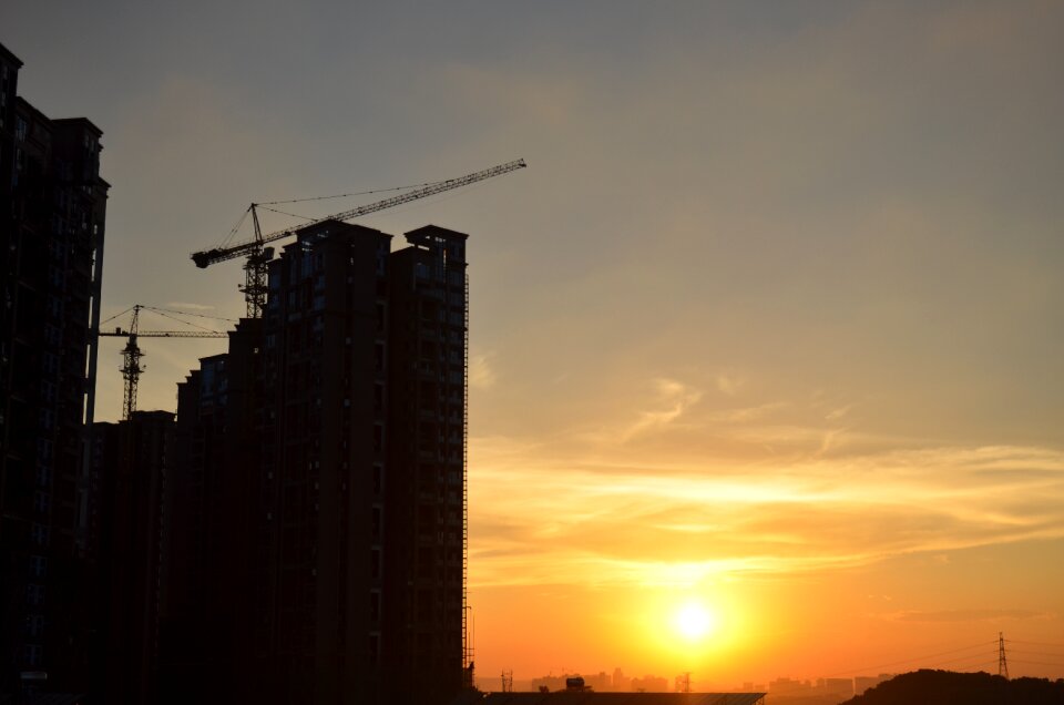 Building in the construction of city silhouette