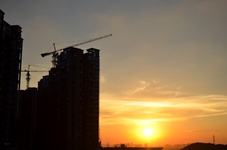 Building in the construction of city silhouette photo