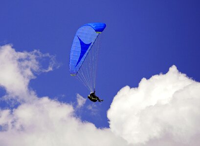 Clouds paragliding suspension wires photo