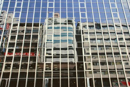 Architecture mirroring window photo