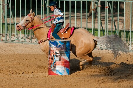 Barrel horseback riding western